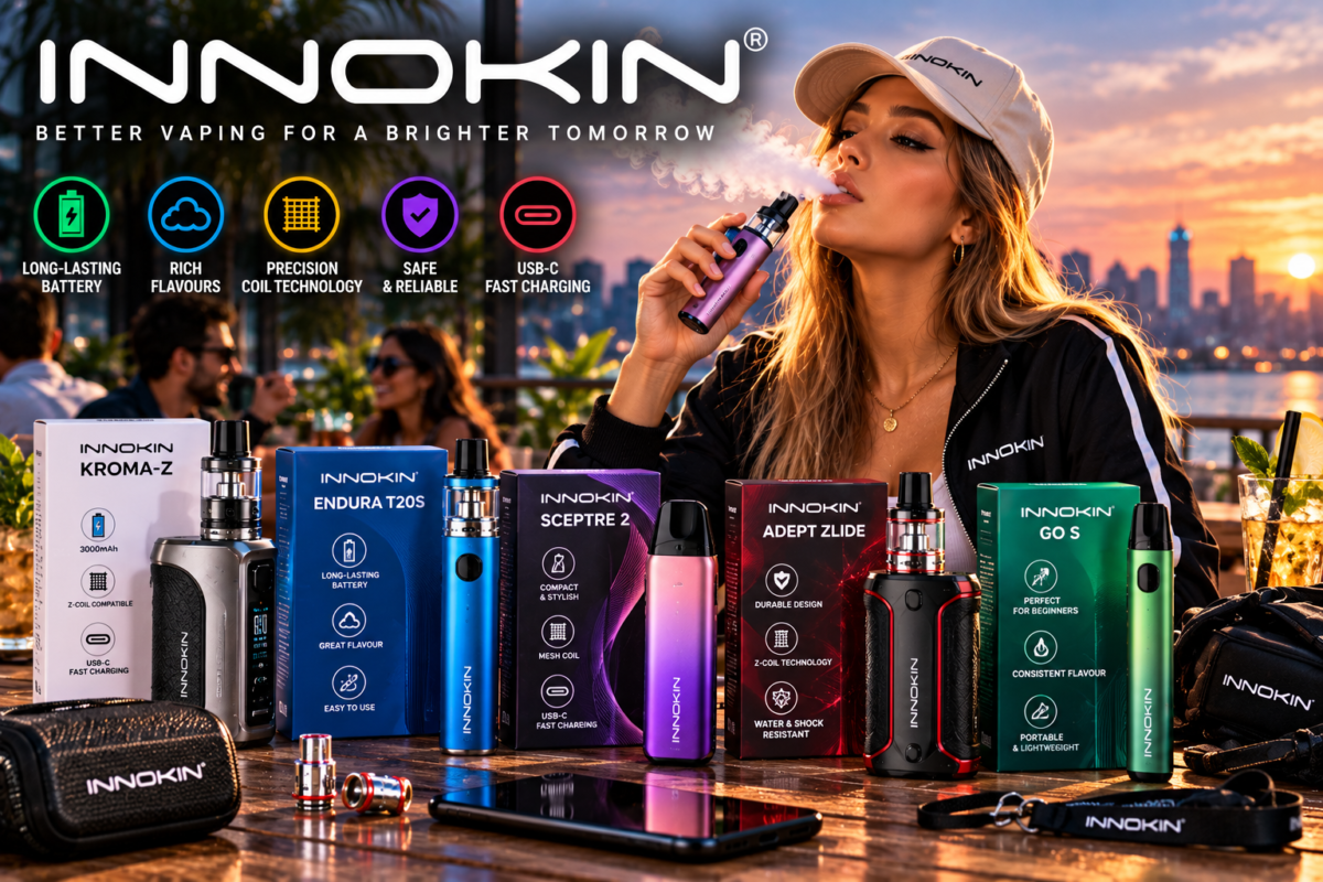 Innokin vape devices and product packaging displayed on an outdoor waterfront table with an adult user